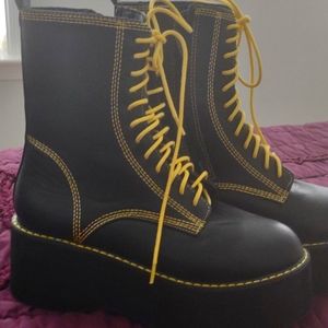 Black and yellow boots never worn